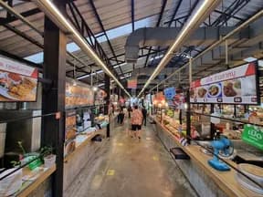 Covered food-stall aisle pictured in the Hat Yai brochure